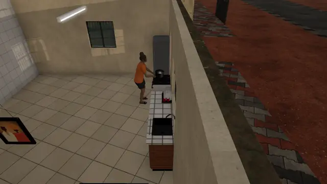 Adaeze cooking at the gas cooker in her kitchen